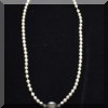 J11. Silver beaded necklace. 